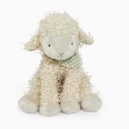 Cream plush lamb with a green checkered bandana