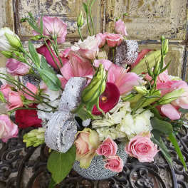 Pink and white mixed bouquet with roses, lilies, and calla lilies