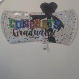 Graduation balloon with colorful "Congrats Graduate!" text