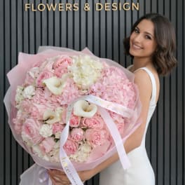 Large pink bouquet with roses, hydrangeas, and white calla lilies