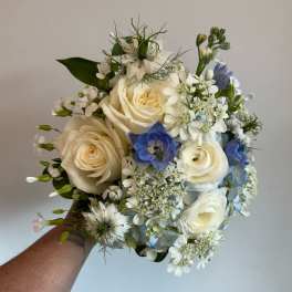 Blue and white hand held bouquet