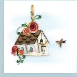 Greeting card with quilled paper birdhouse, two small birds, and decorative spiral flowers.
