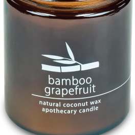 Brown glass candle jar labeled bamboo grapefruit