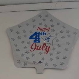 Star-shaped silver foil balloon with 'Happy 4th of July' text and scattered stars.