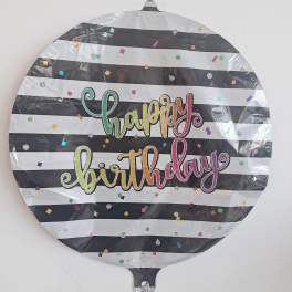 Round birthday balloon with black-and-white stripes and colorful confetti text