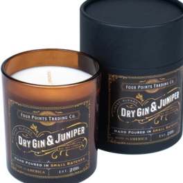 Two scented candles in dark glass jars with black labels