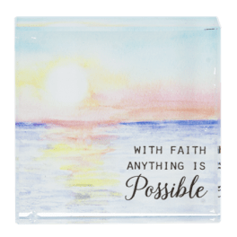Decorative plaque with a sunrise scene and the words "With faith anything is possible"