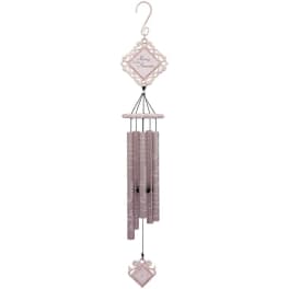 Pink memorial wind chime with hanging tubes and decorative plaques
