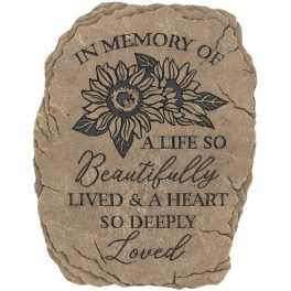 Memorial stone with sunflower design and sympathy text