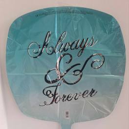 Teal foil balloon with silver script text reading “Always & Forever.”