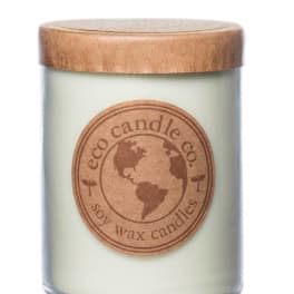 Soy wax candle in a glass jar with a wooden lid