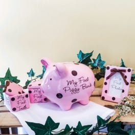 Pink polka-dot baby keepsake set with piggy bank and photo frame