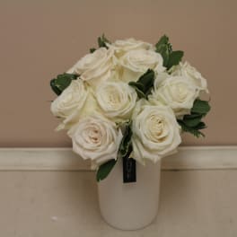 White rose bouquet in a white vase