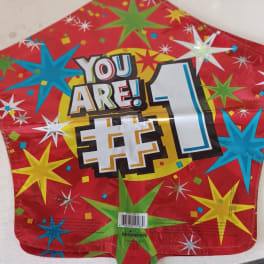 Red star-patterned balloon with "YOU ARE!" and a large number 1