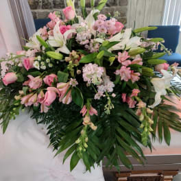 Large pink and white floral spray with lilies and roses
