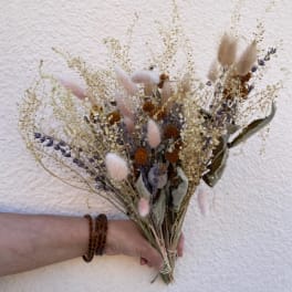 Dried bouquet with pink bunny tails and beige grasses
