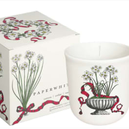 White candle in a frosted glass jar with floral print and matching box