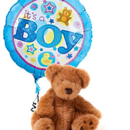 Teddy bear with a blue "It's a Boy" balloon