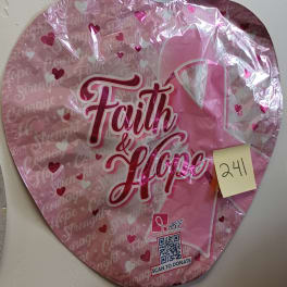 Pink heart-shaped balloon with "Faith & Hope" text and a breast cancer ribbon