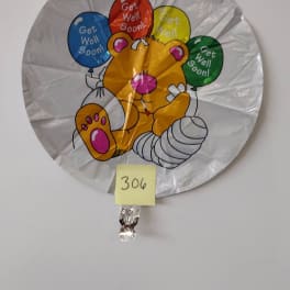 Round get-well balloon with a cartoon bear and colorful balloons