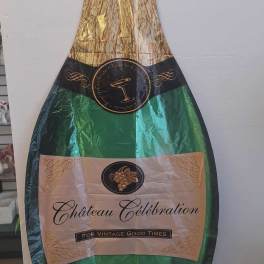 Champagne bottle-shaped foil balloon with gold, green, and black design