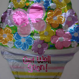 Colorful flower-shaped foil balloon with "Get Well Soon!" text