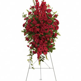 Tall red floral spray on a metal easel