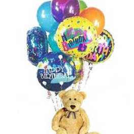 Birthday balloons with a teddy bear