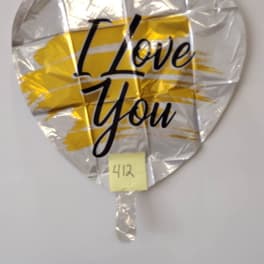 Heart-shaped silver balloon with "I Love You" text and yellow accents