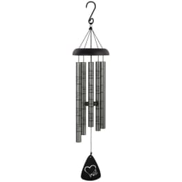 Black metal wind chime with silver tubes and a heart-shaped pendant