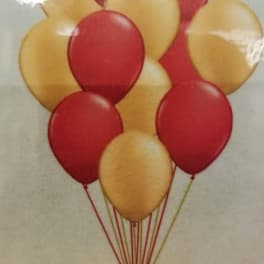 Cluster of red and gold balloons with strings attached