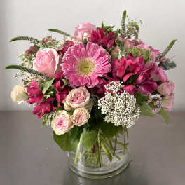 Pink mixed bouquet in a clear glass vase
