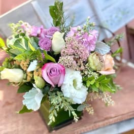 Mixed bouquet of pink, white, and lavender flowers