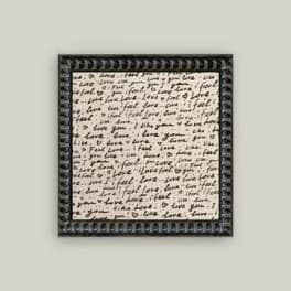 Framed wall art with handwritten love phrases