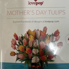 Box of mixed tulips labeled Mother's Day Tulips