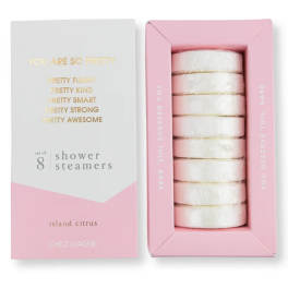 Pink and white box of shower steamers with gold lettering