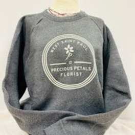 Gray sweatshirt with a florist logo on a mannequin