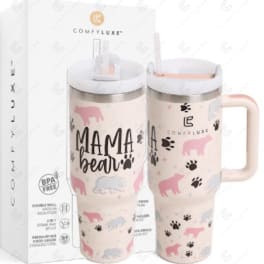 Set of two pink "Mama Bear" insulated tumblers with bear and paw print designs in front of a branded box