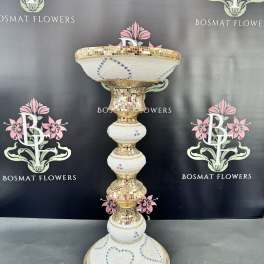 Tall gold-and-white mosaic pedestal vase with jeweled heart accents