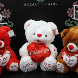 Three plush teddy bears with "I Love You" hearts