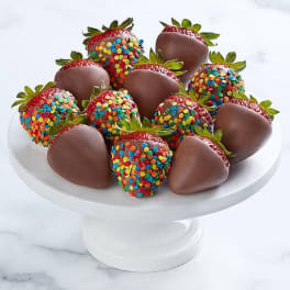 Chocolate-covered strawberries on a white pedestal stand