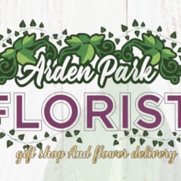 Arden Park Florist logo with purple lettering and green leafy vines