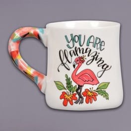 White mug with a flamingo illustration and colorful handle