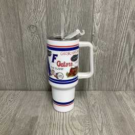 White travel mug with a handle and straw, printed with Florida Gators graphics