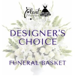 Funeral basket design with white flowers and pale greenery