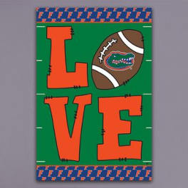 Florida Gators-themed sign with the word LOVE and a football
