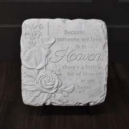 Decorative memorial plaque with roses and a sympathy quote