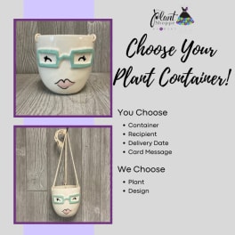 Ceramic face planter with teal glasses and a hanging cord