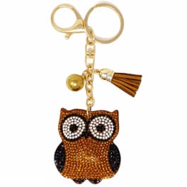 Owl keychain with a gold tassel and bead charm