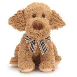 Plush brown dog with a plaid bow on a white background
